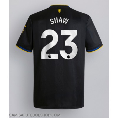 Camisa de time de futebol Manchester United Luke Shaw #23 Replicas 3º Equipamento 2025-26 Manga Curta Camisa de time de futebol Manchester United Luke Shaw #23 Replicas 3º Equipamento 2025-26 Manga Curta